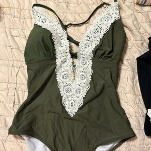 Green one piece swim suit